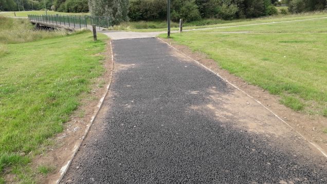 Path under construction with the old path beyond, July 2019