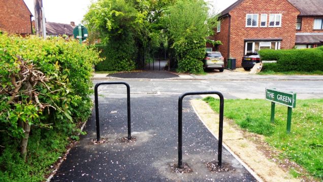 Safety barriers on The Green, looking towards the Redlands Road path section, April 2020