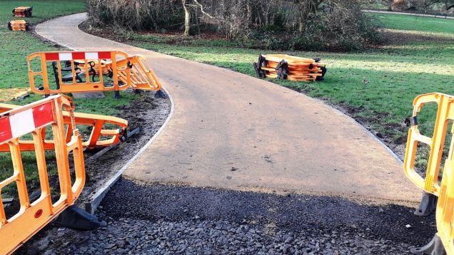 The layers of new surfacing on the park paths, December 2019
